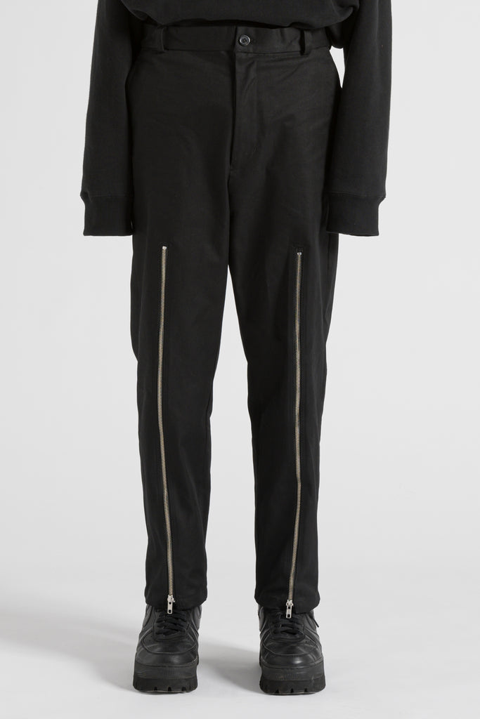 ZIPPED TROUSERS